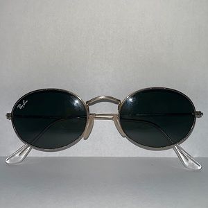 Ray Ban oval gold frame glasses